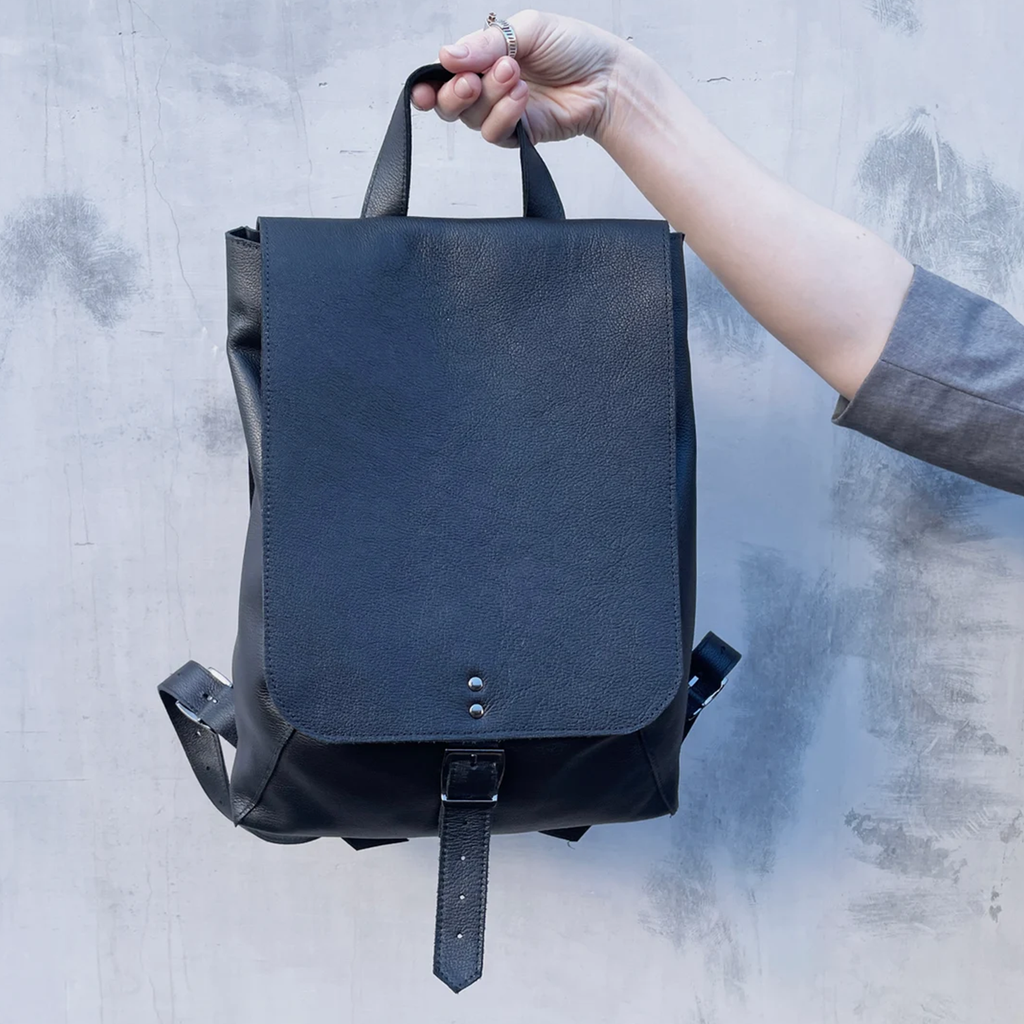 Solid Black Grain Vertical Flap Backpack With Adjustable Buckle Strap, Multi Storage Pockets And Built-In Interior Key Hook